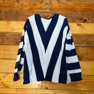 Blue and White striped sweater.